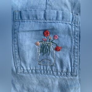 Hand embroidered flower vase on Loft jeans
